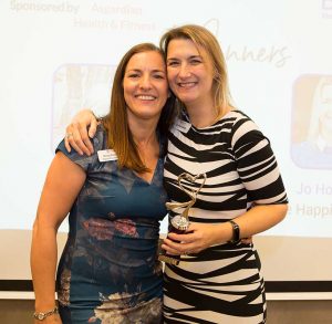 Bizmums Conference - Jo Howarth holding a trophy