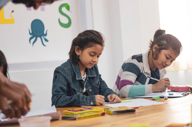 kids in school colouring