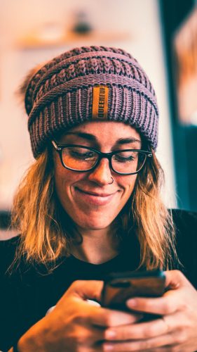 A woman looking at her phone